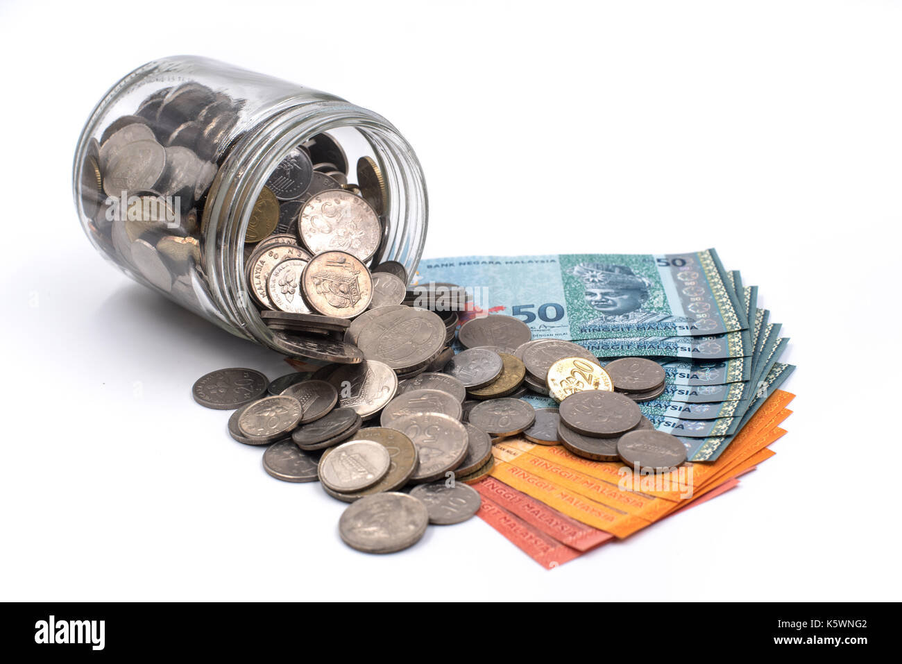 Malaysia ringgit e monete in un vaso Foto Stock
