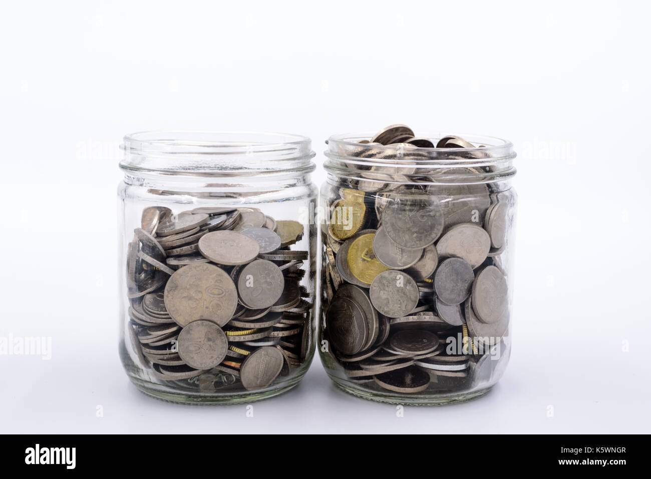 Malaysia ringgit e monete in un vaso Foto Stock