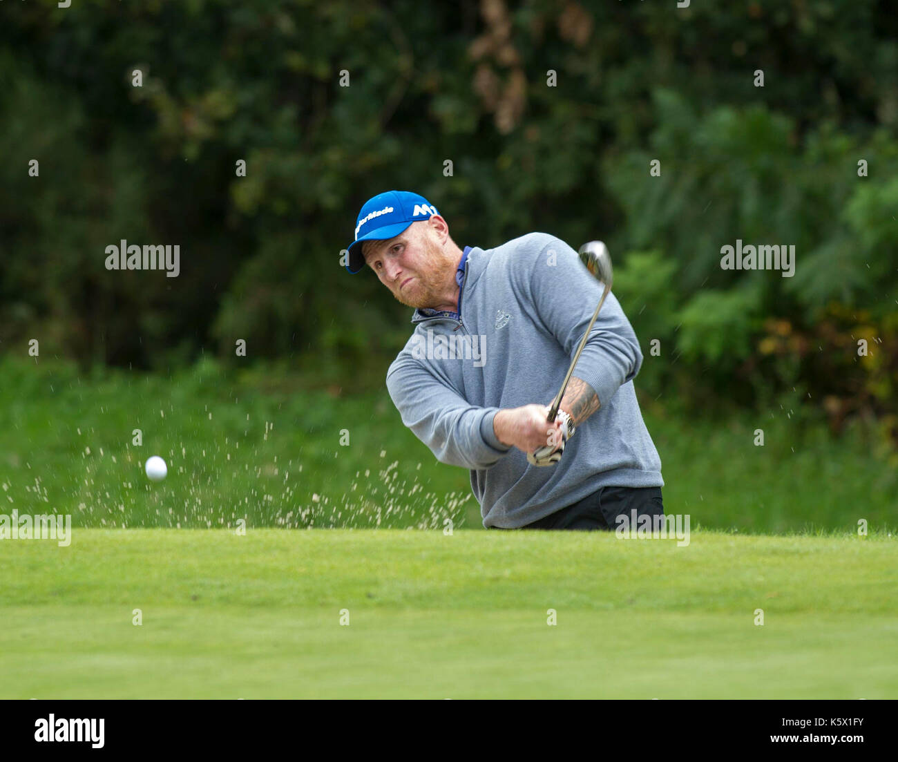 John Hartson giocando a golf Foto Stock