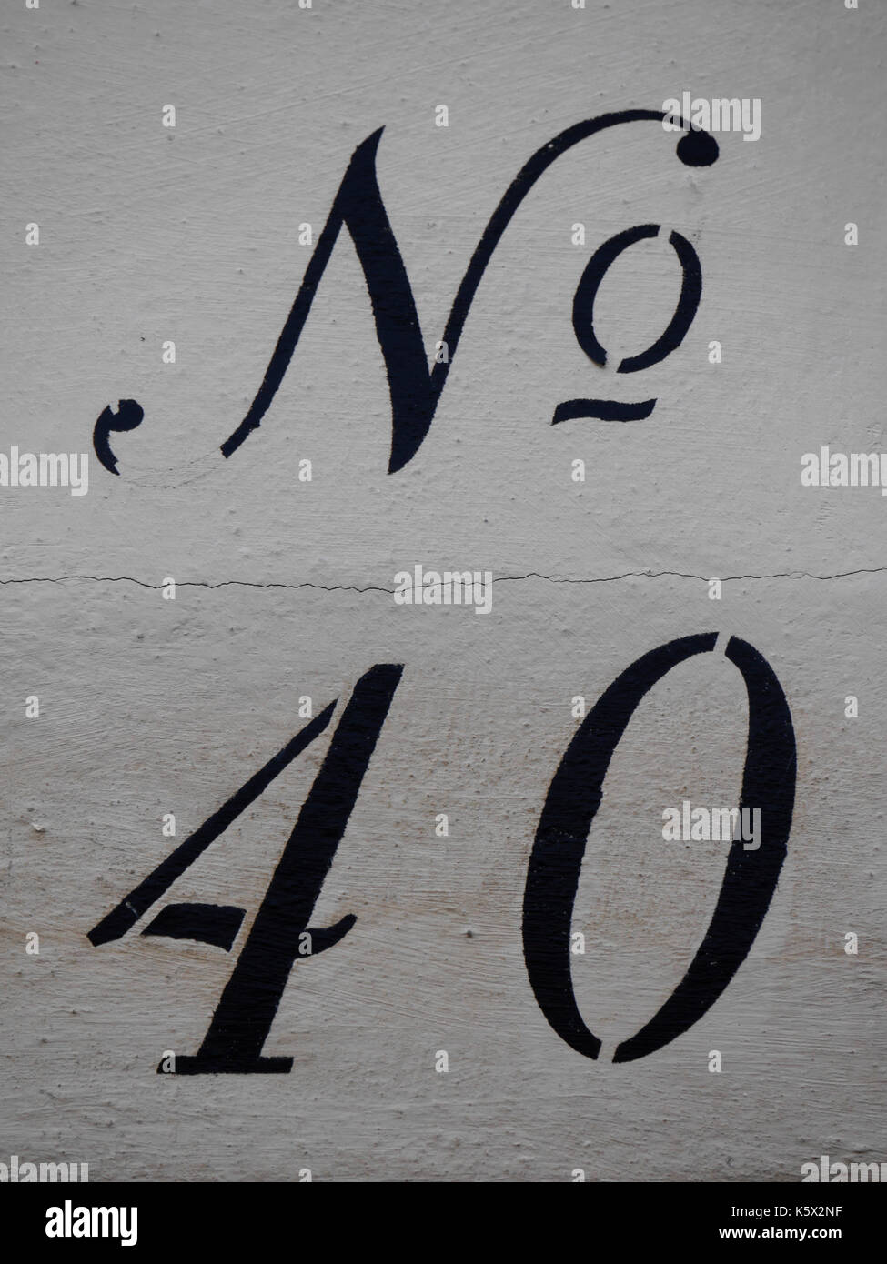 Stile od il numero civico 40. nero su sfondo bianco. Foto Stock