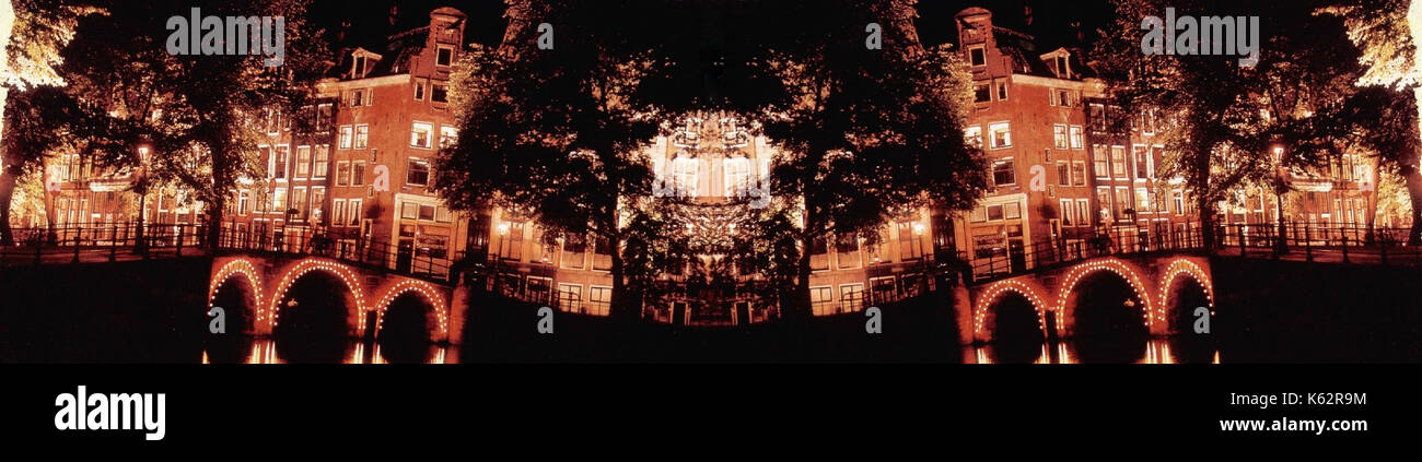 Atmosfera serale, Amsterdam ponte con illuminazione e canal. Foto Stock