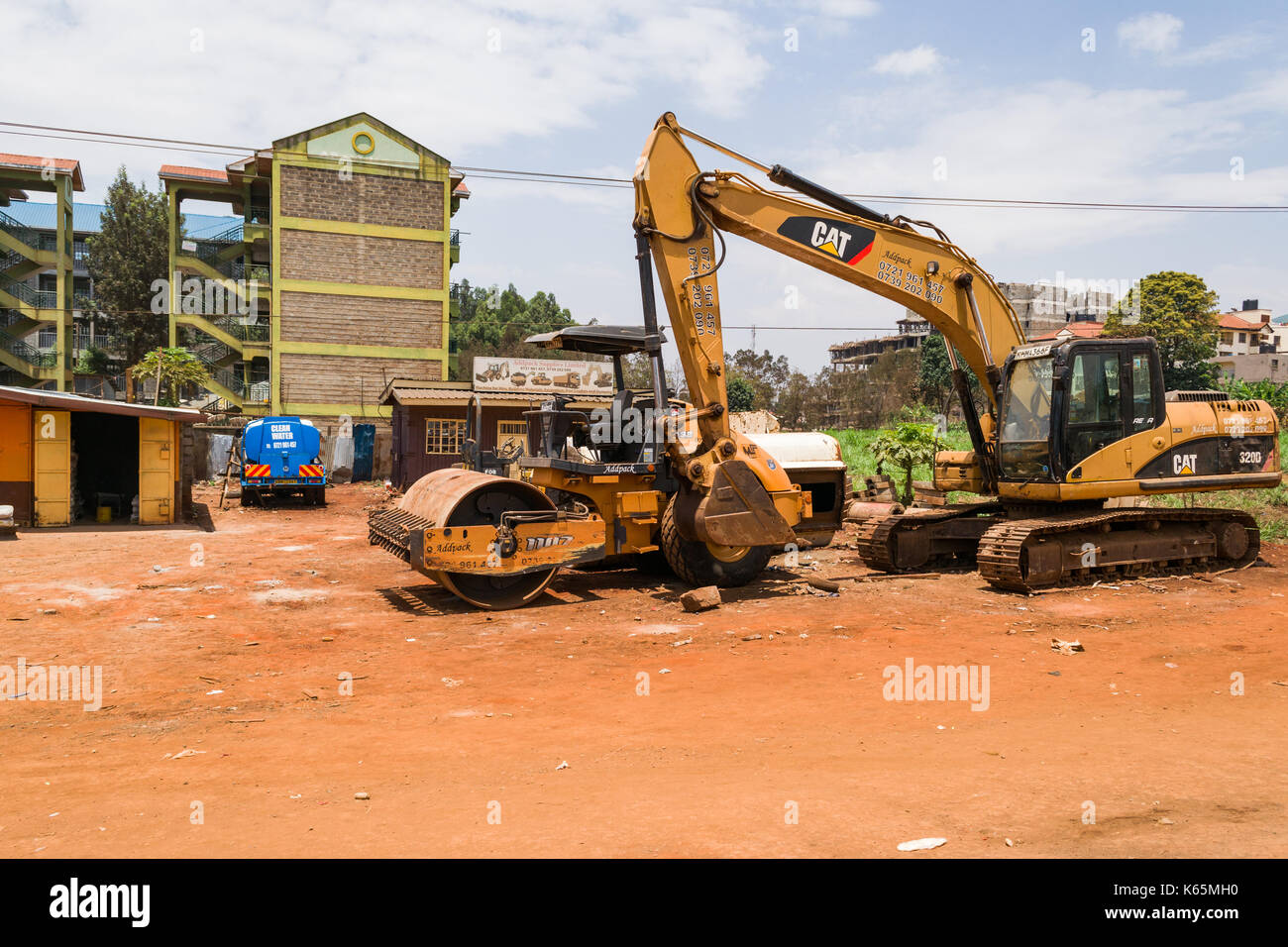 CAT apparecchiature per la costruzione di strade, Kenya Foto Stock