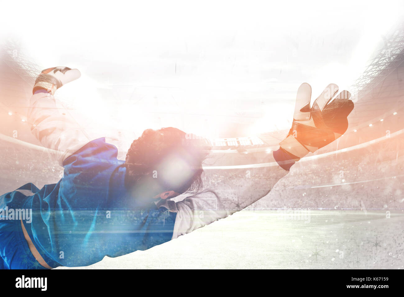 Immersioni subacquee portiere n lo stadio Foto Stock