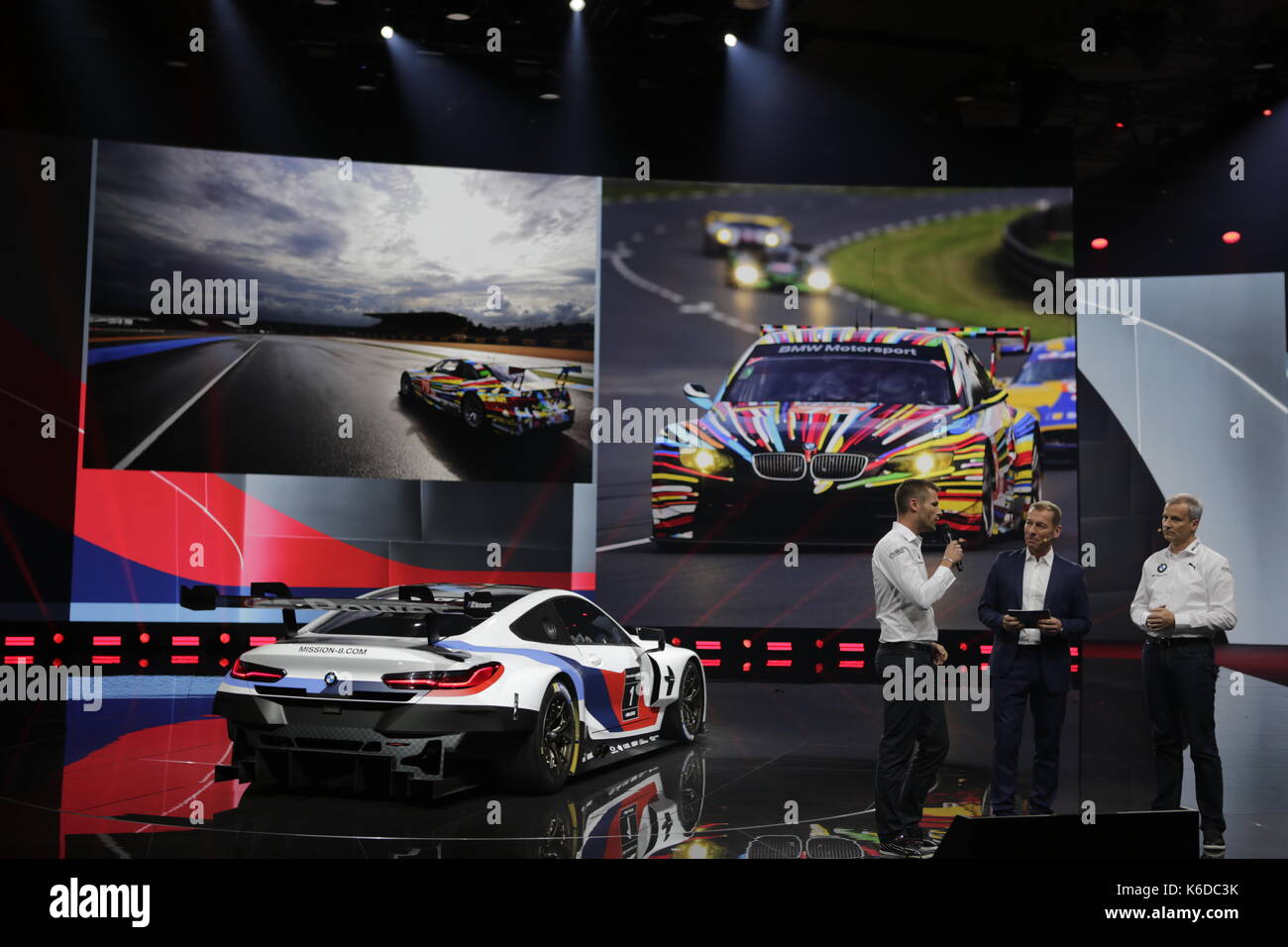 Francoforte, Germania. 12 settembre 2017. bmw race driver Martin Tomczyk (sinistra), il presentatore Tv markus othmer (centro) e direttore di BMW Motorsport jens marquardt (destro) presente la nuova BMW M8 gte race car alla conferenza stampa. tedesco racing team BMW Motorsport, una sovvenzione della casa automobilistica tedesca BMW, presenta la nuova razza auto bmw m8 gte in occasione di una conferenza stampa del 2017 internationale automobil-ausstellung (IAA) a Francoforte. Foto Stock