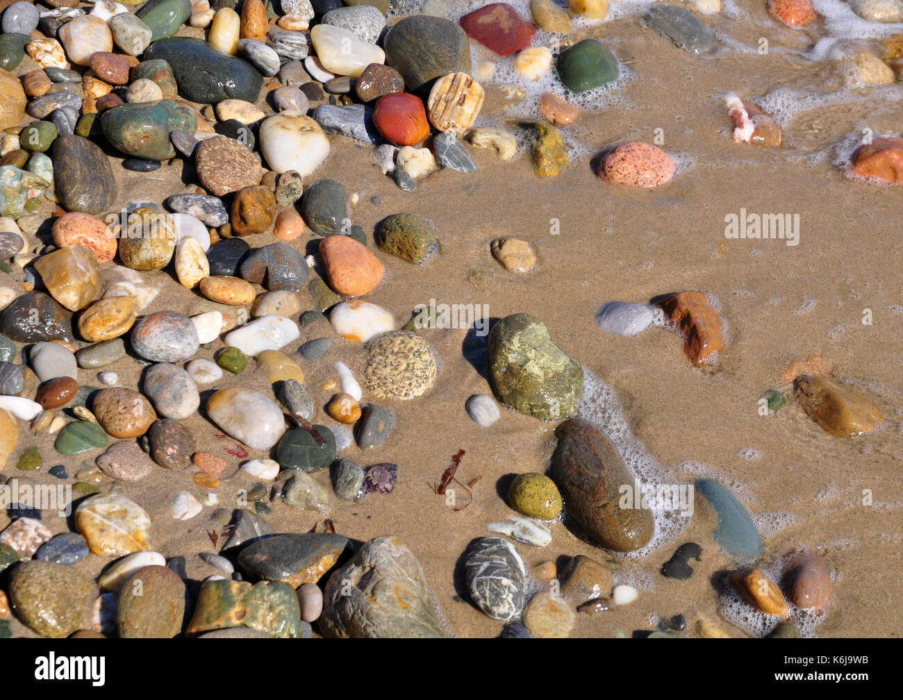 Colori del mare pietre e sabbia Foto Stock