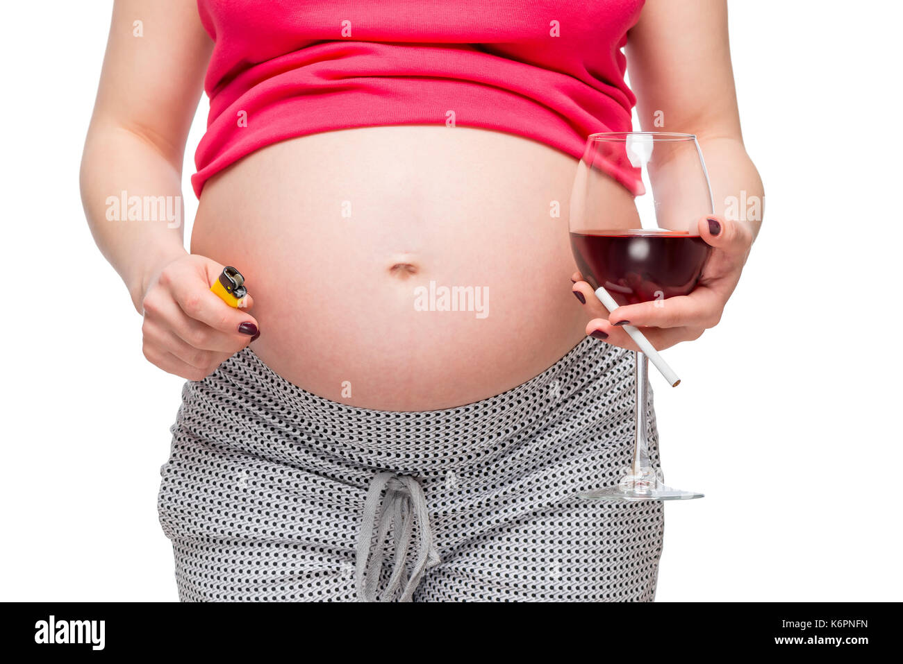 La pancia di una donna incinta close-up, una donna ha cattive abitudini - concetto foto Foto Stock
