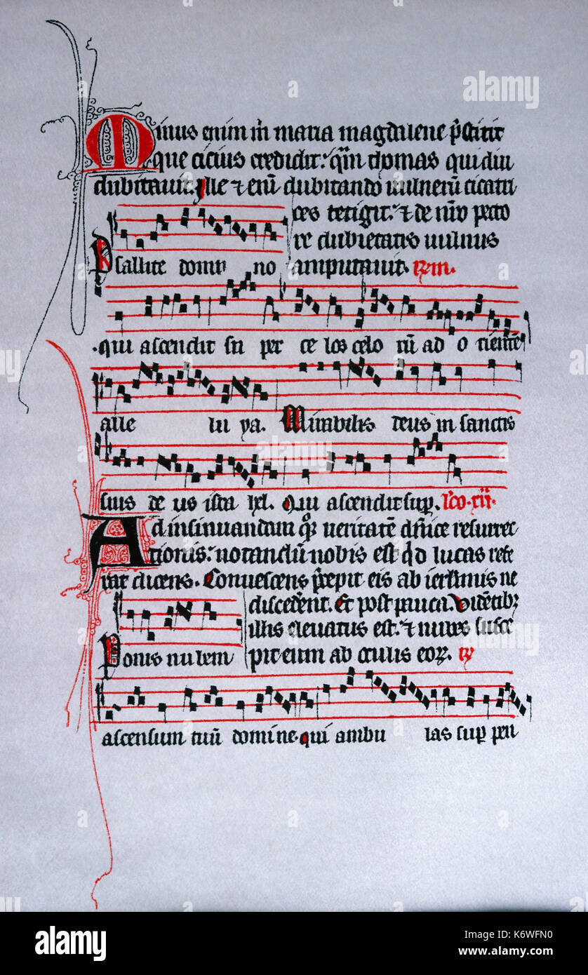 La notazione corale dal manoscritto Antiphonal, Francia, c. 1400. Quattro linea doga (in rosso) posizionando le note precedenti parole scritte su carta pergamena. Foto Stock