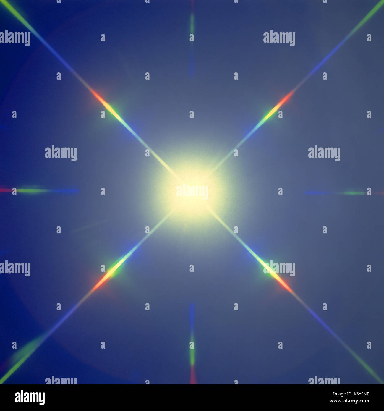 Modello a stella con la diffrazione arcobaleno di colori dello spettro Foto Stock