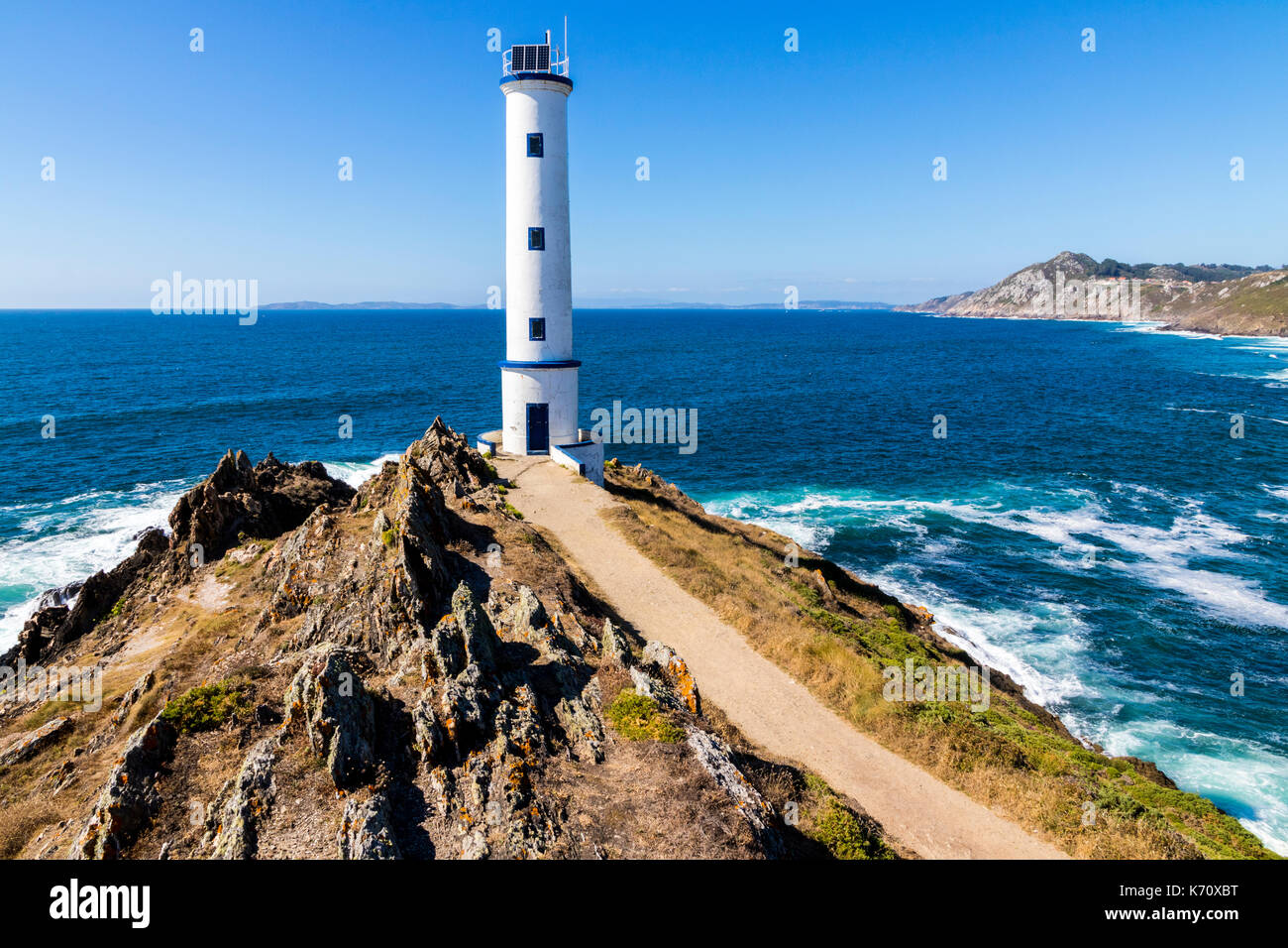 Faro di cabo home, un iconico capo in Cangas, Pontevedra, Galizia, Spagna Foto Stock