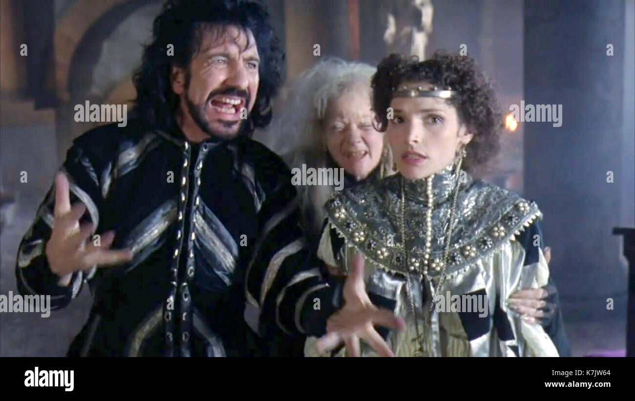 La foto Deve Essere Accreditata ©da Alpha 070000 (1991) Alan Rickman come Sheriff George di Nottingham e Mary Elizabeth Mastrantonio come Marian Dubois nel film Robin Hood: Prince of Thieves. Foto Stock