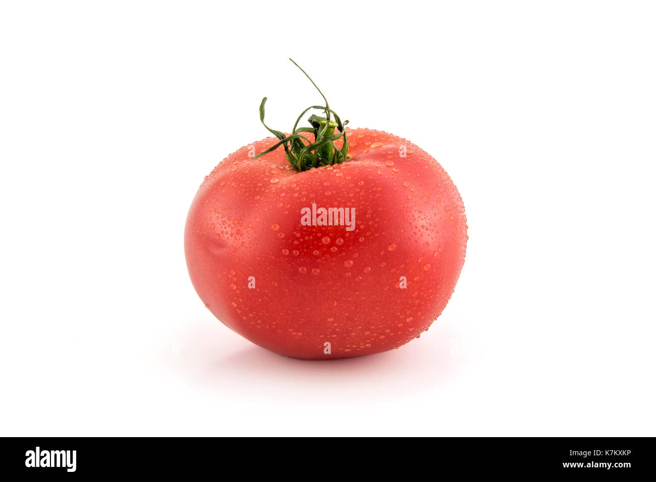 Pomodoro rosso isolato su sfondo bianco foto. Bella immagine, lo sfondo, lo sfondo Foto Stock
