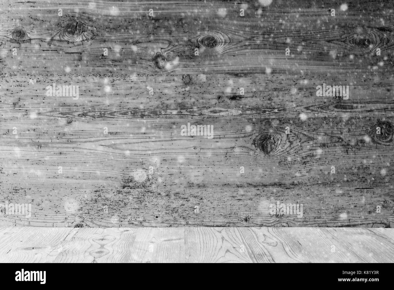 Grigio texture di legno con i fiocchi di neve, sfondo con spazio di copia Foto Stock