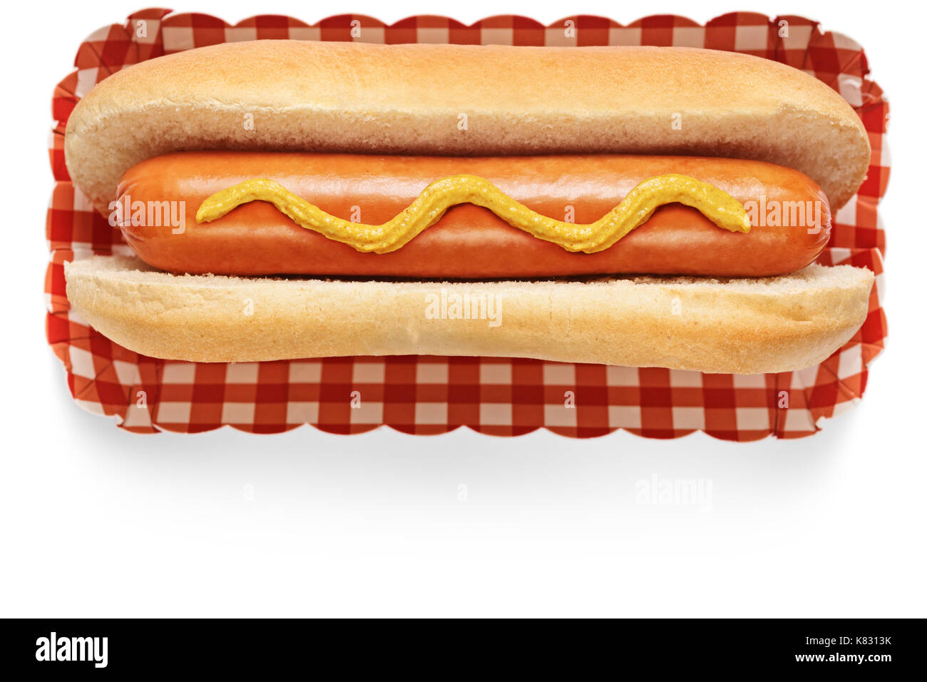 Hotdog con senape isolati su sfondo bianco Foto Stock