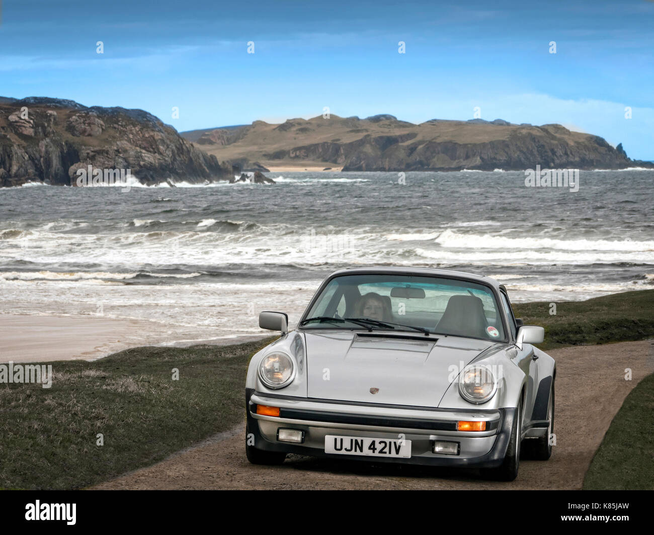 1979 Porsche 911 turbo guida su per la costa nord di 500 Itinerario turistico Foto Stock