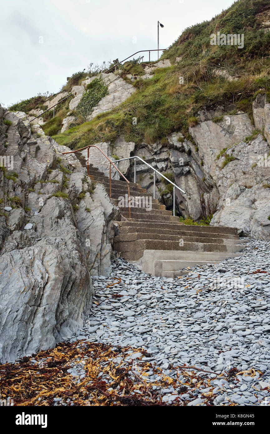 Scalini per scendere in spiaggia a Port Jack, Onchan, Isola di Man Foto Stock