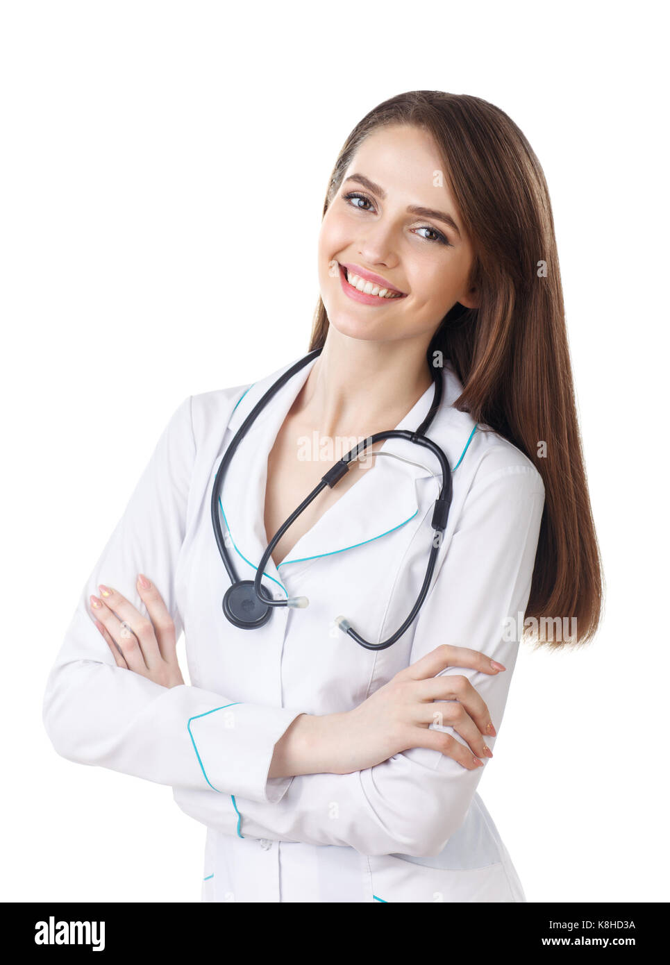 Bella sorridente medico con le braccia incrociate isolato su sfondo bianco Foto Stock