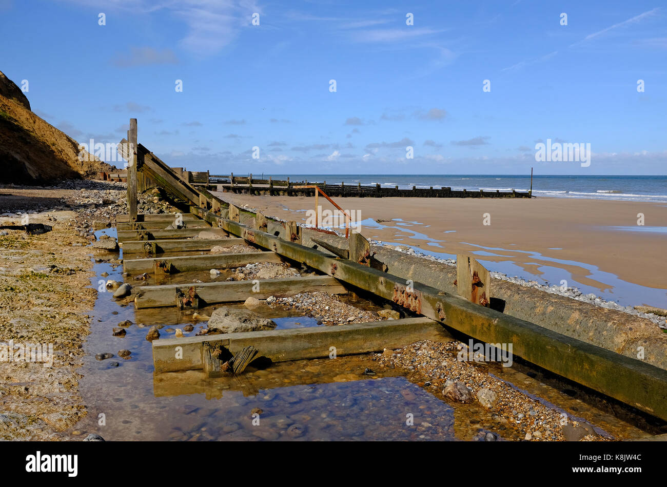 Impossibile le difese del mare, Sheringham Beach, a nord di Norfolk, Inghilterra Foto Stock