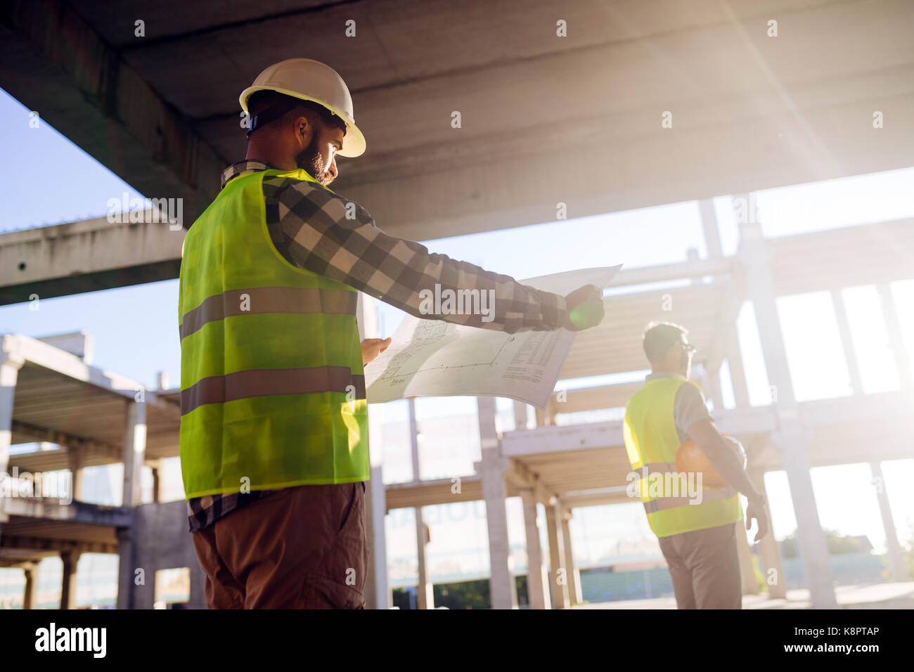 Foto di costruzione ingegnere di lavoro sul sito di costruzione Foto Stock