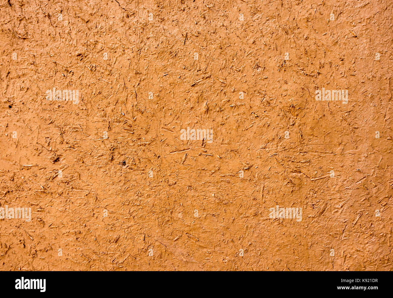 Fango marocchino parete in colore ocra come sfondo. Foto Stock