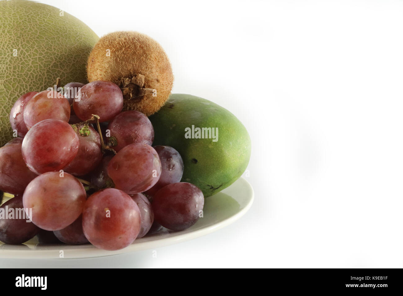 Frutta fresca e piastra Foto Stock