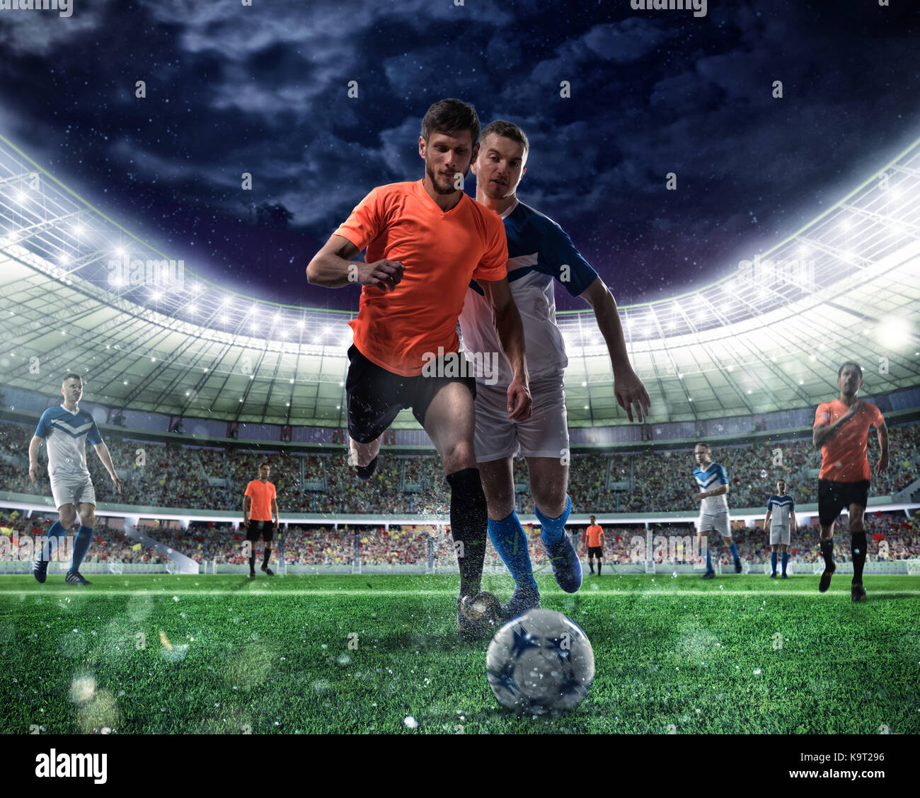 Scena di calcio con concorrenti i giocatori di calcio allo stadio Foto Stock