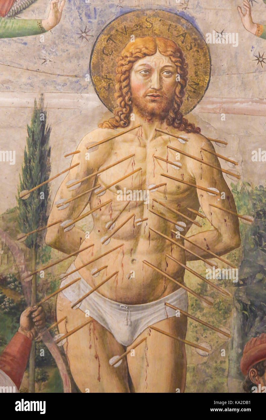 Affresco raffigurante il martirio di San Sebastiano di Benozzo Gozzoli (1465) nella collegiata di san gimignano, Italia. Foto Stock