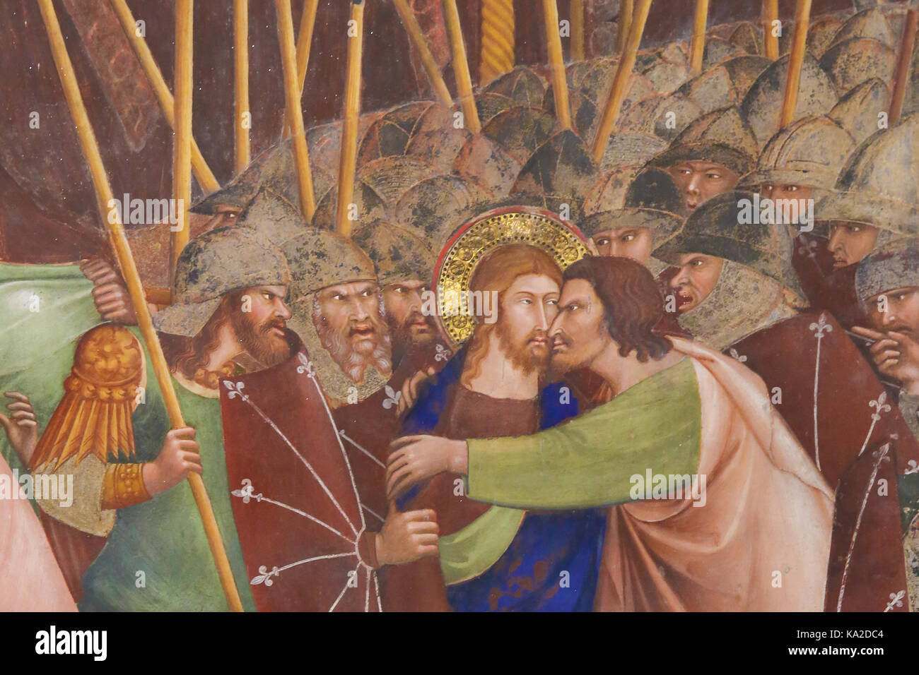 Giuda tradisce Gesù con un bacio. Un affresco trecentesco nella collegiata di san gimignano, Italia. Foto Stock