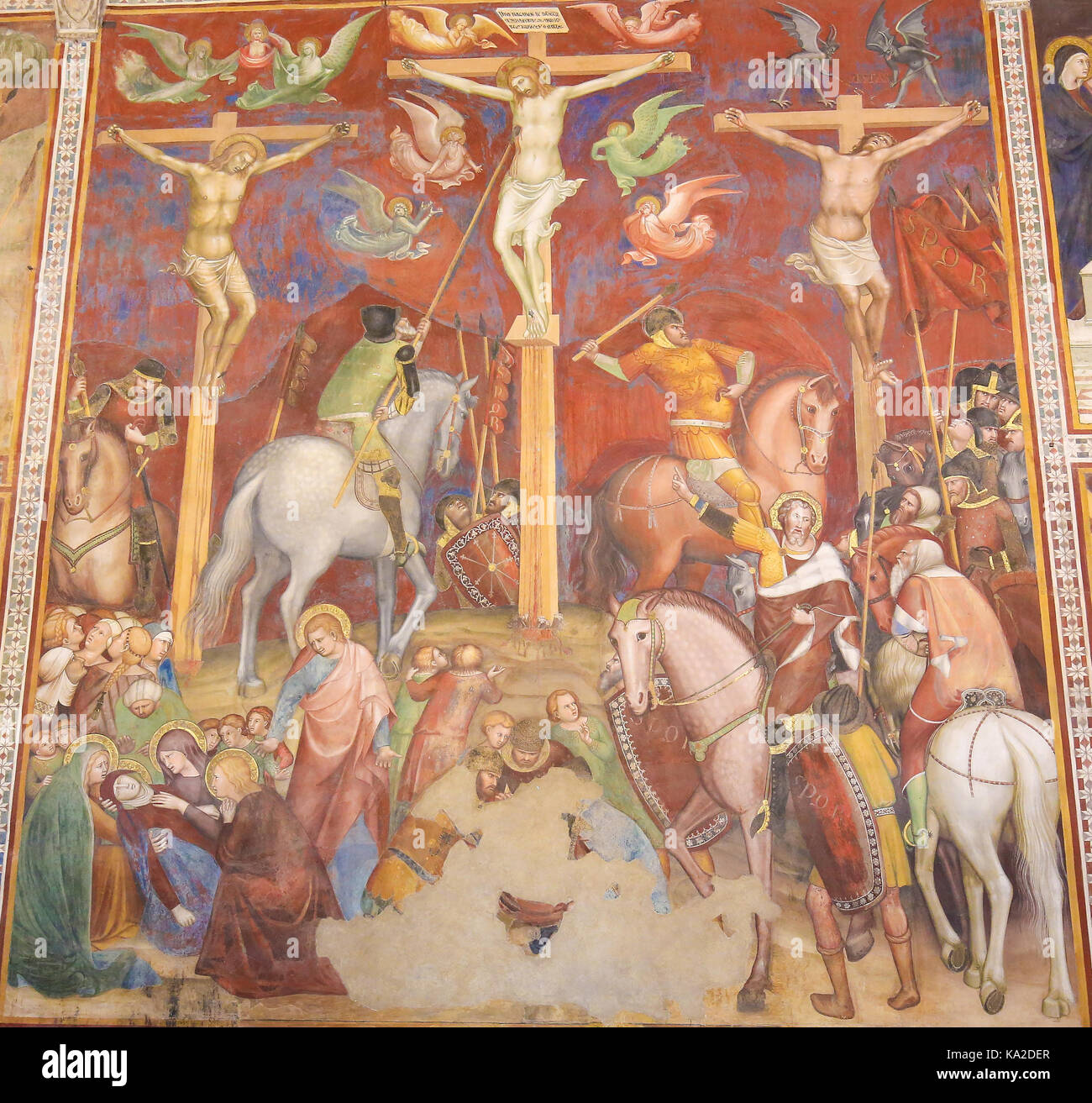 Renaissance affresco raffigurante la crocifissione di Gesù Cristo nella collegiata di san gimignano, Italia. Foto Stock