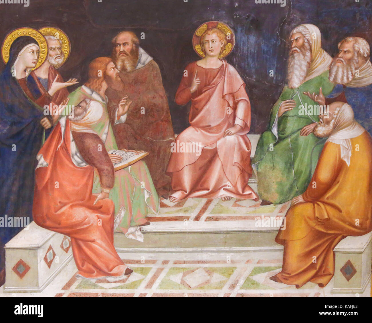 Renaissance affresco raffigurante Gesù Cristo come un ragazzo tra i dottori del Tempio di Gerusalemme, nella collegiata di san gimignano, Italia. Foto Stock