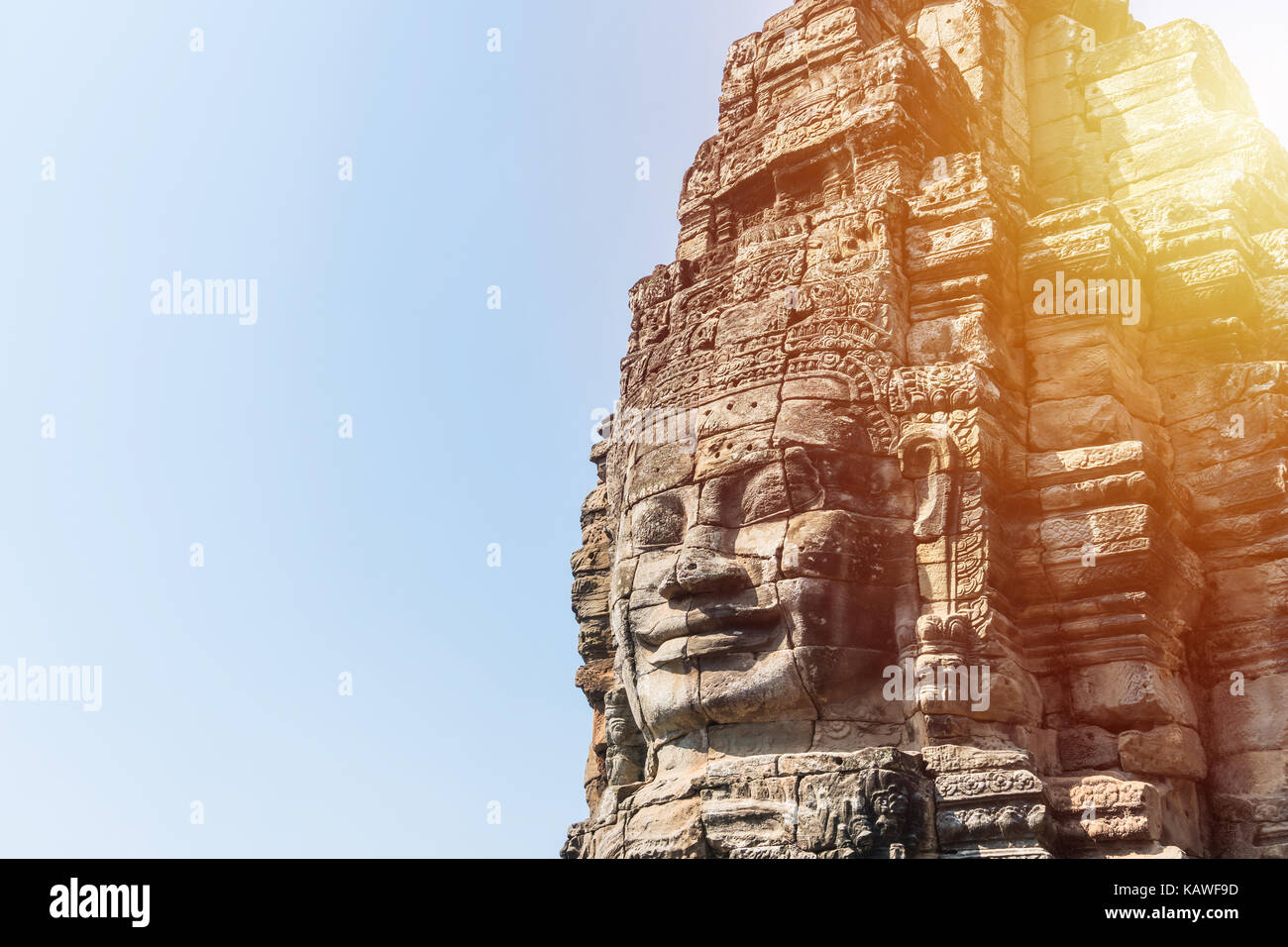 Sorriso in pietra faccia a tempio Bayon in Angkor Thom siem reap Cambogia Foto Stock