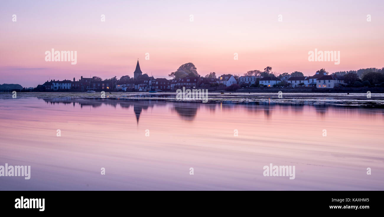 Bosham Harbour nel West Sussex al tramonto. Foto Stock