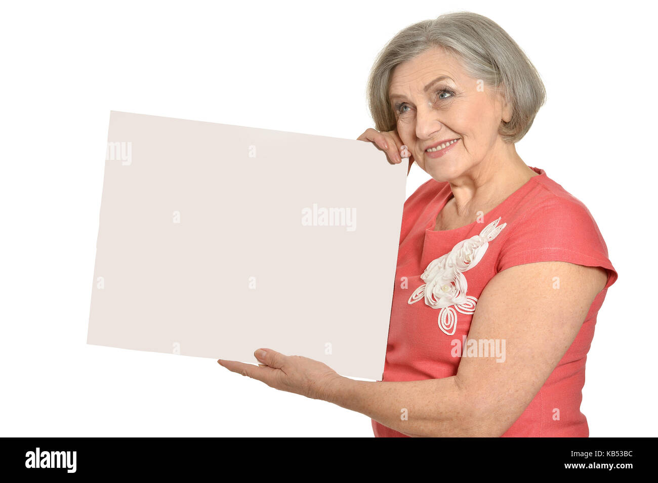 Donna anziana con la scheda vuota Foto Stock