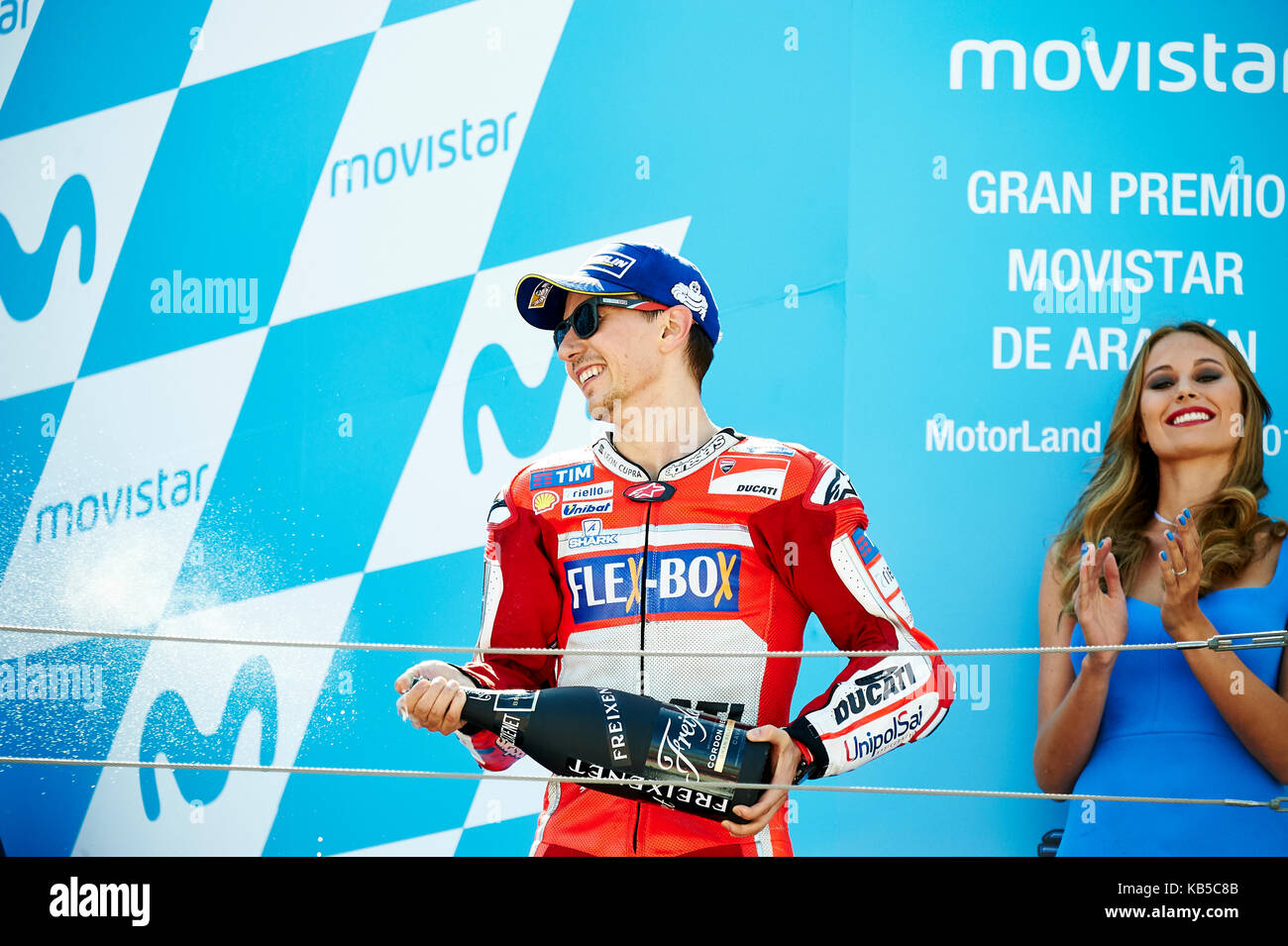 Aragona, Spagna. 24 settembre, 2017. Jorge Lorenzo DEL DUCATI MOTOGP TEAM festeggia il suo terzo posto durante l'aragona gran premio di motogp. Credito: pa Foto Stock