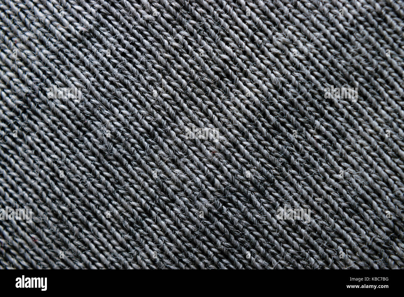 Close-up di grigio fibre sintetiche tessuto nel modello Foto Stock