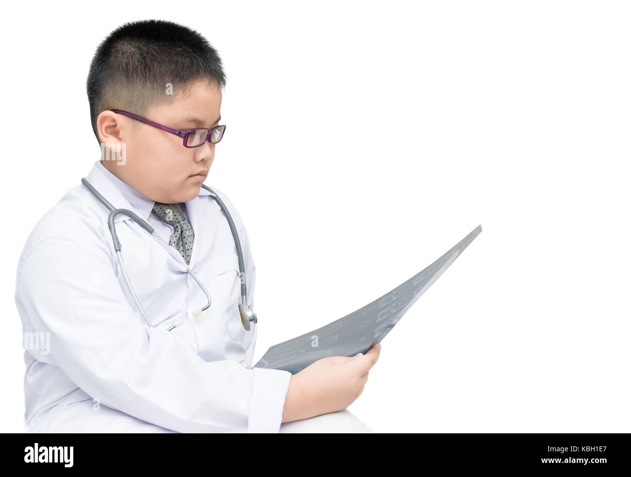 Ragazzo obesi medico controllare la pellicola a raggi x isolato su sfondo bianco, health care concept Foto Stock