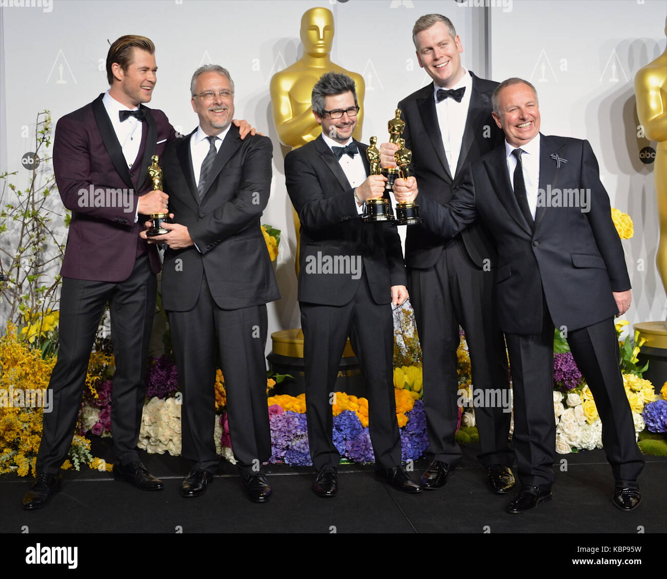 L'attore Chris Hemsworth, mixer audio Skip Lievsay, NIV Adiri, Christopher Benstead e Chris Munro si pongono nella sala stampa durante l'86esimo annuale Academy Awards al Loews Hollywood Hotel il 2 marzo 2014 a Hollywood, California. Foto Stock