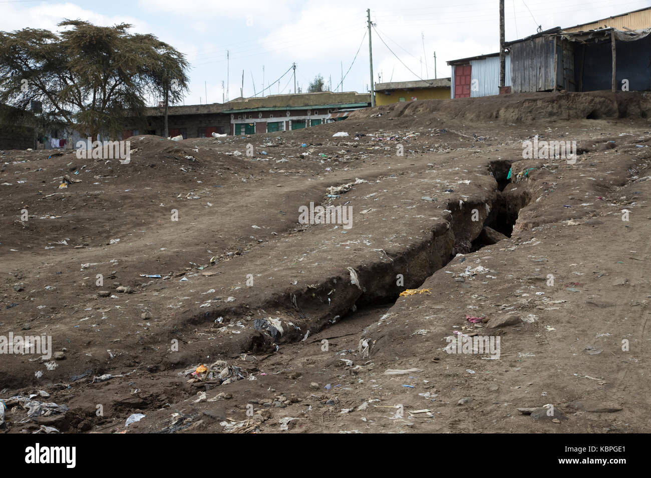 Erosione di burrone al di fuori di sviluppo kamere township kenya Foto Stock