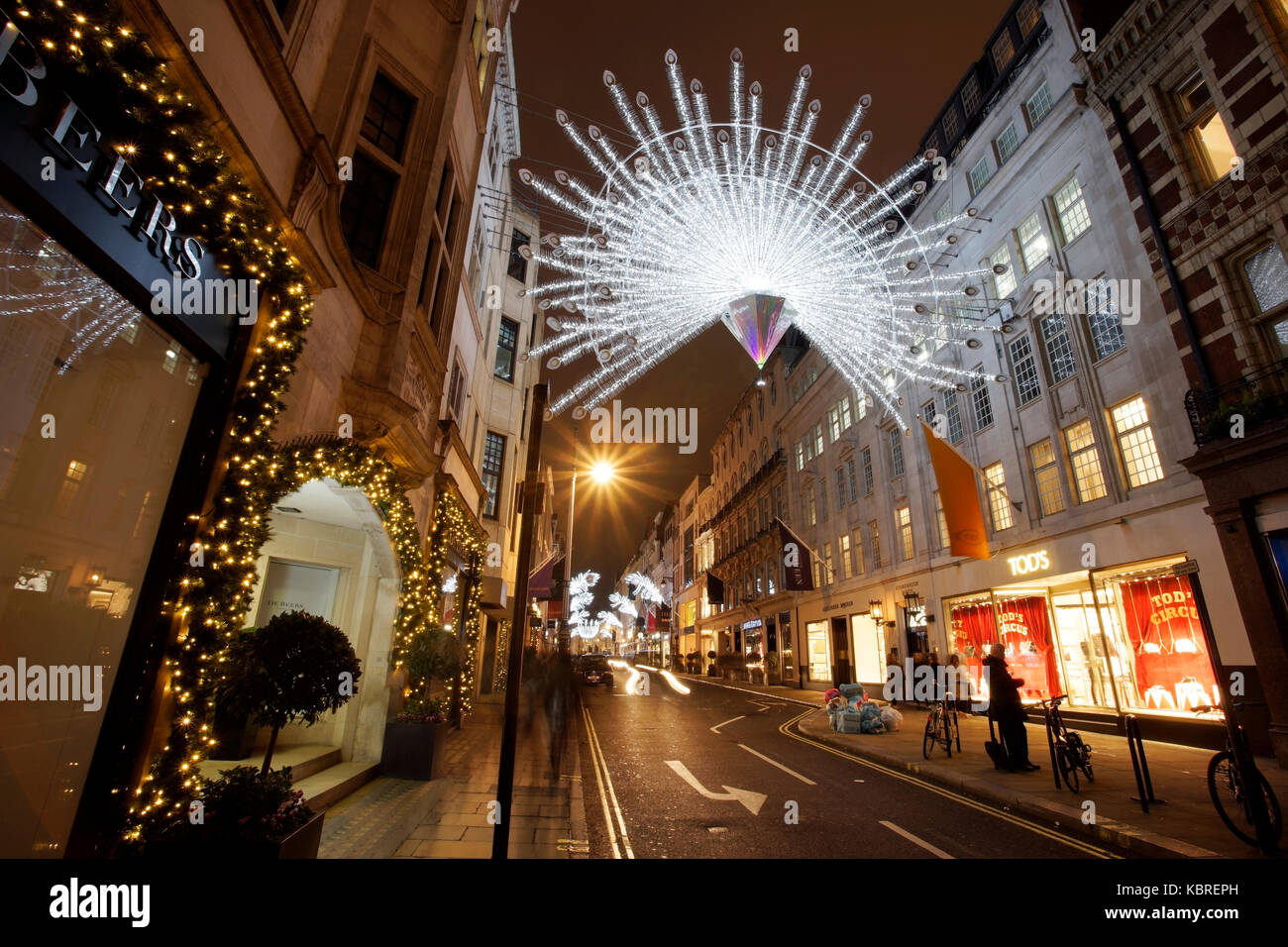 Le luci di Natale visualizzare su Bond Street a Londra. Il moderno colorato le luci di Natale di attirare e incoraggiare la gente per strada. Foto Stock