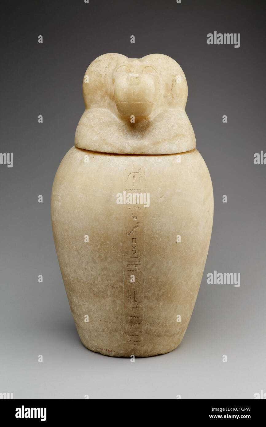 Vaso canopi con un babbuino capo-coperchio (Hapy), 664-525 A.C. Foto Stock