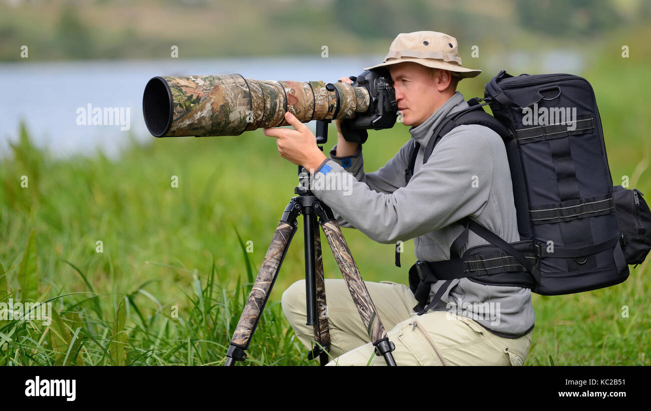 Professional Wildlife Photographer outdoor Foto Stock