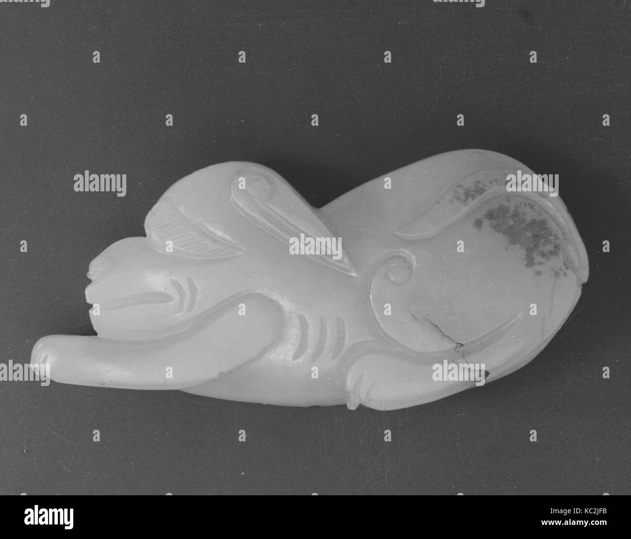 Cane, secolo XVII, Cina, giada, legno di teak stand, H. 1 5/16 in. (3.3 cm); L. 2 3/4 in. (7 cm), Jade Foto Stock