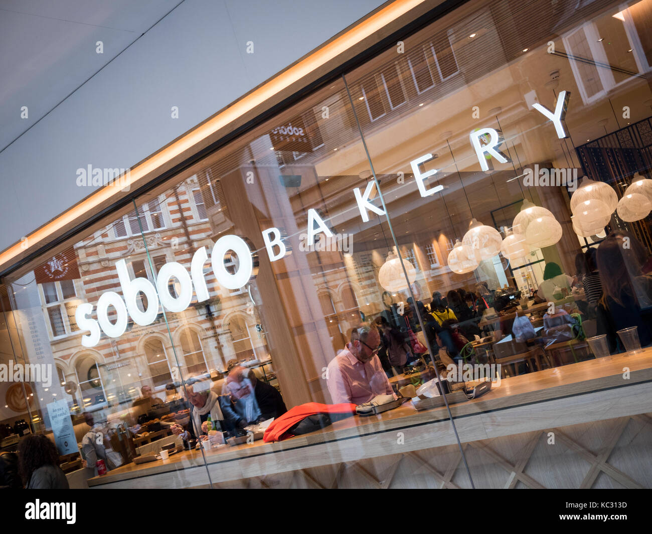 La finestra e accedere al panificio Soboro il giapponese e il coreano ristorante e cafè Petty Cury Cambridge Regno Unito Foto Stock