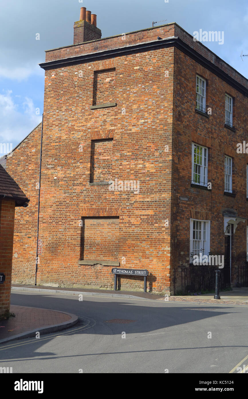 Edificio a tre piani sul basso fila di fisher, oxford mostra murate windows forse come risultato della finestra imposta Foto Stock