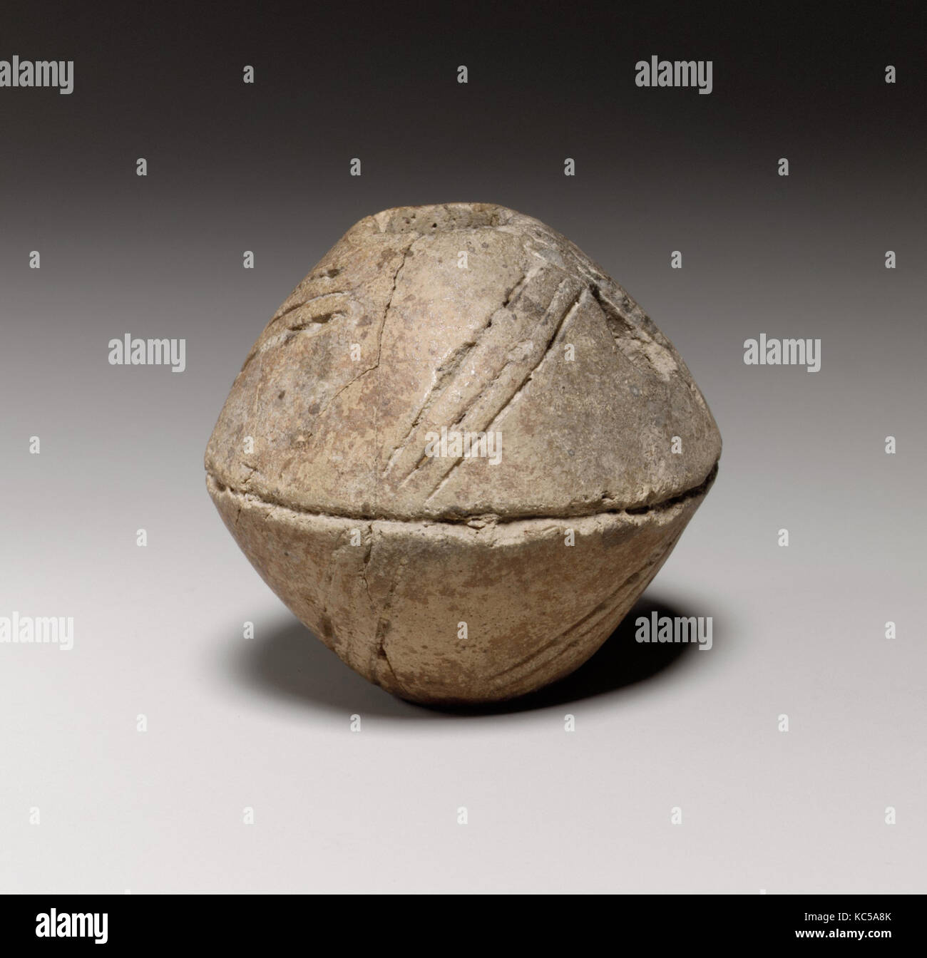 In Terracotta mandrino biconica-whorl, ca. 1600-1200 A.C. Foto Stock