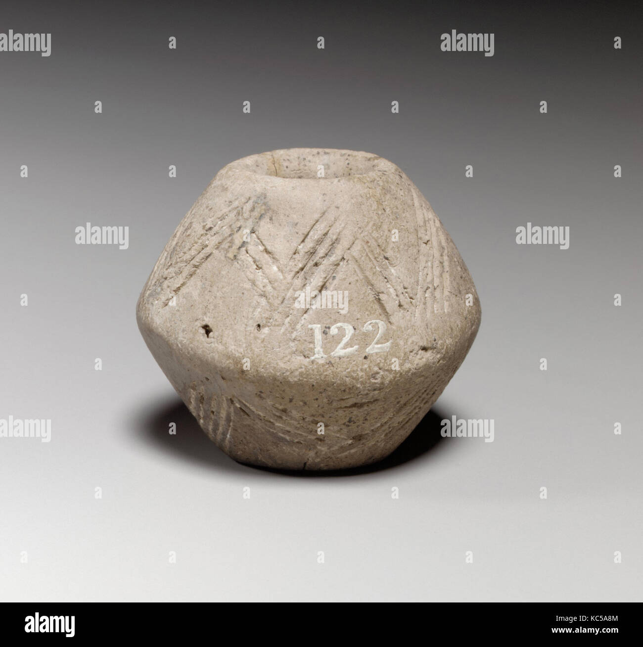 In Terracotta mandrino biconica-whorl, ca. 1600-1200 A.C. Foto Stock