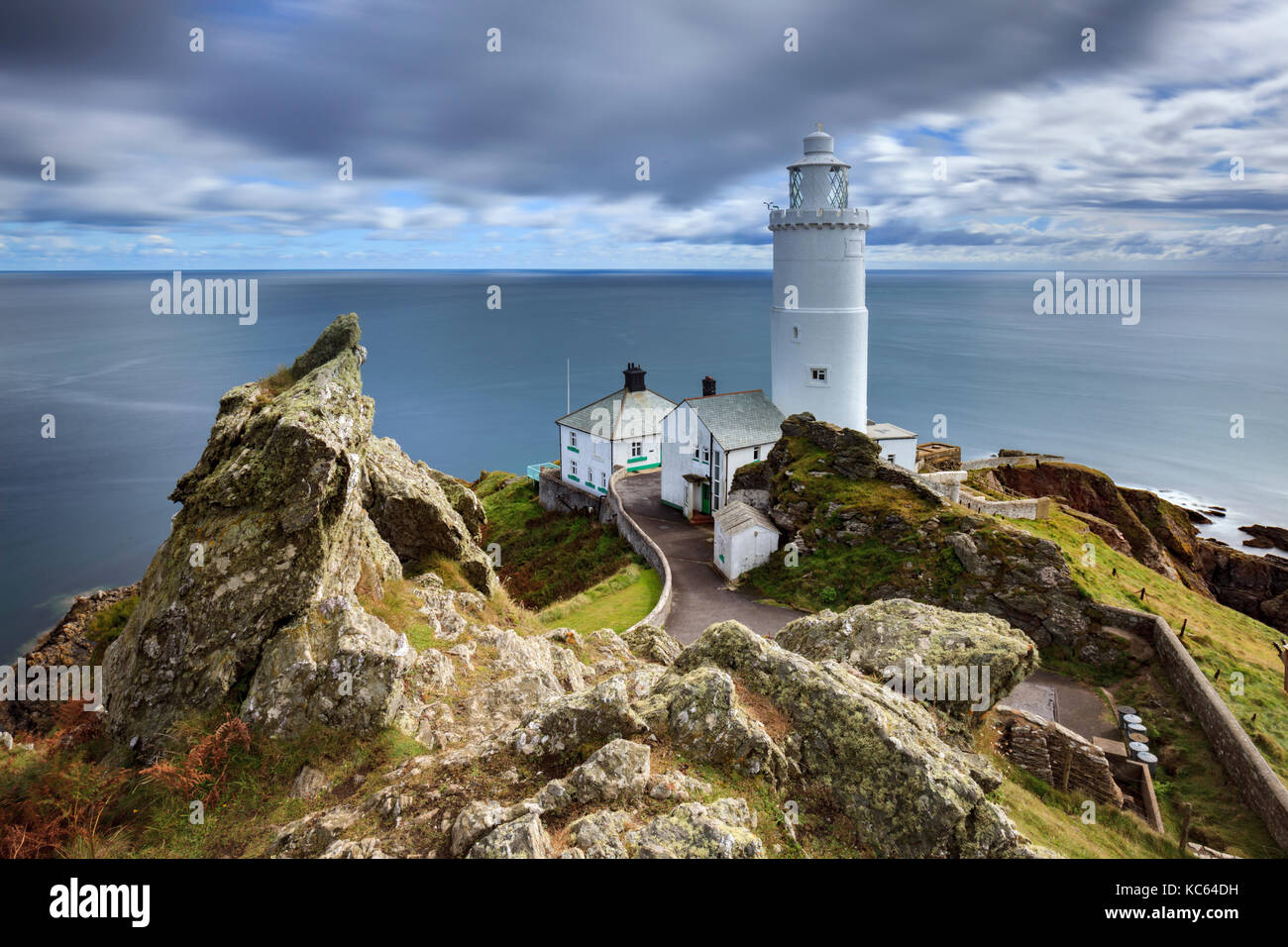 Punto di partenza il faro in South Devon. Foto Stock