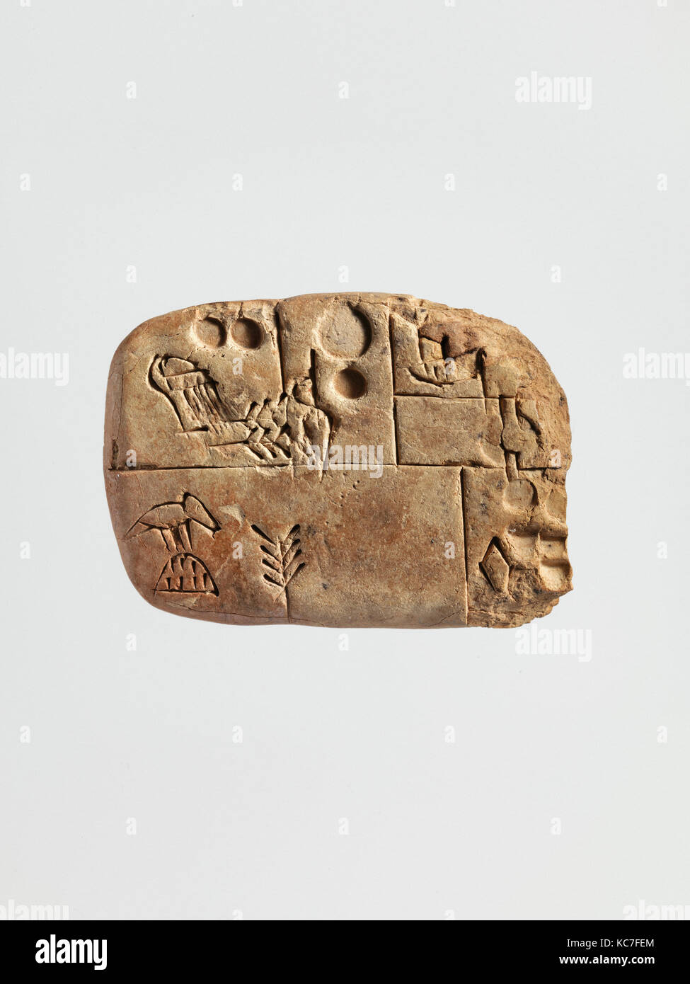Tavoletta cuneiforme: conto amministrativo relativo alla distribuzione di orzo e farro, ca. 3100-2900 A.C. Foto Stock