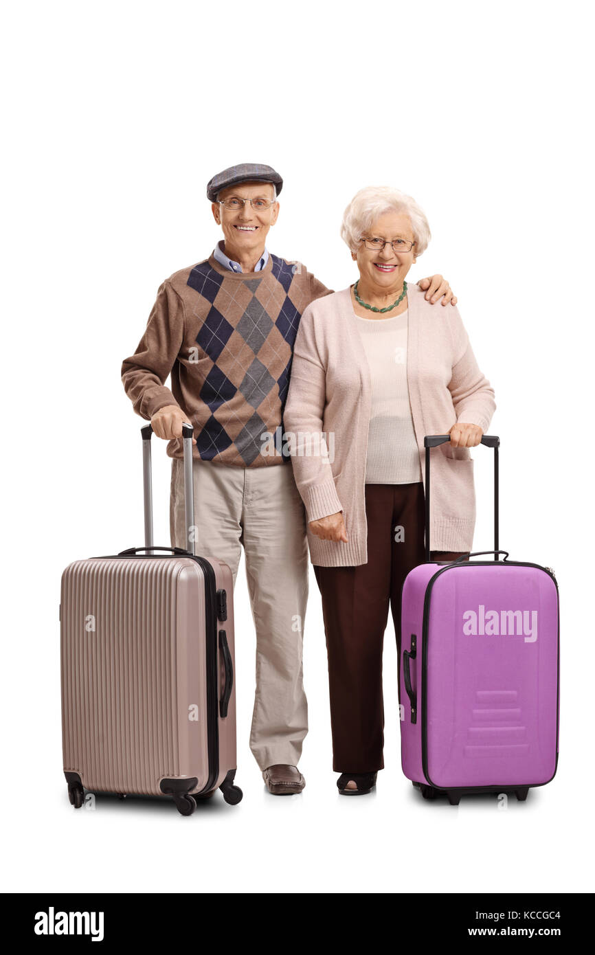 A piena lunghezza Ritratto di una coppia senior con le valigie isolati su sfondo bianco Foto Stock