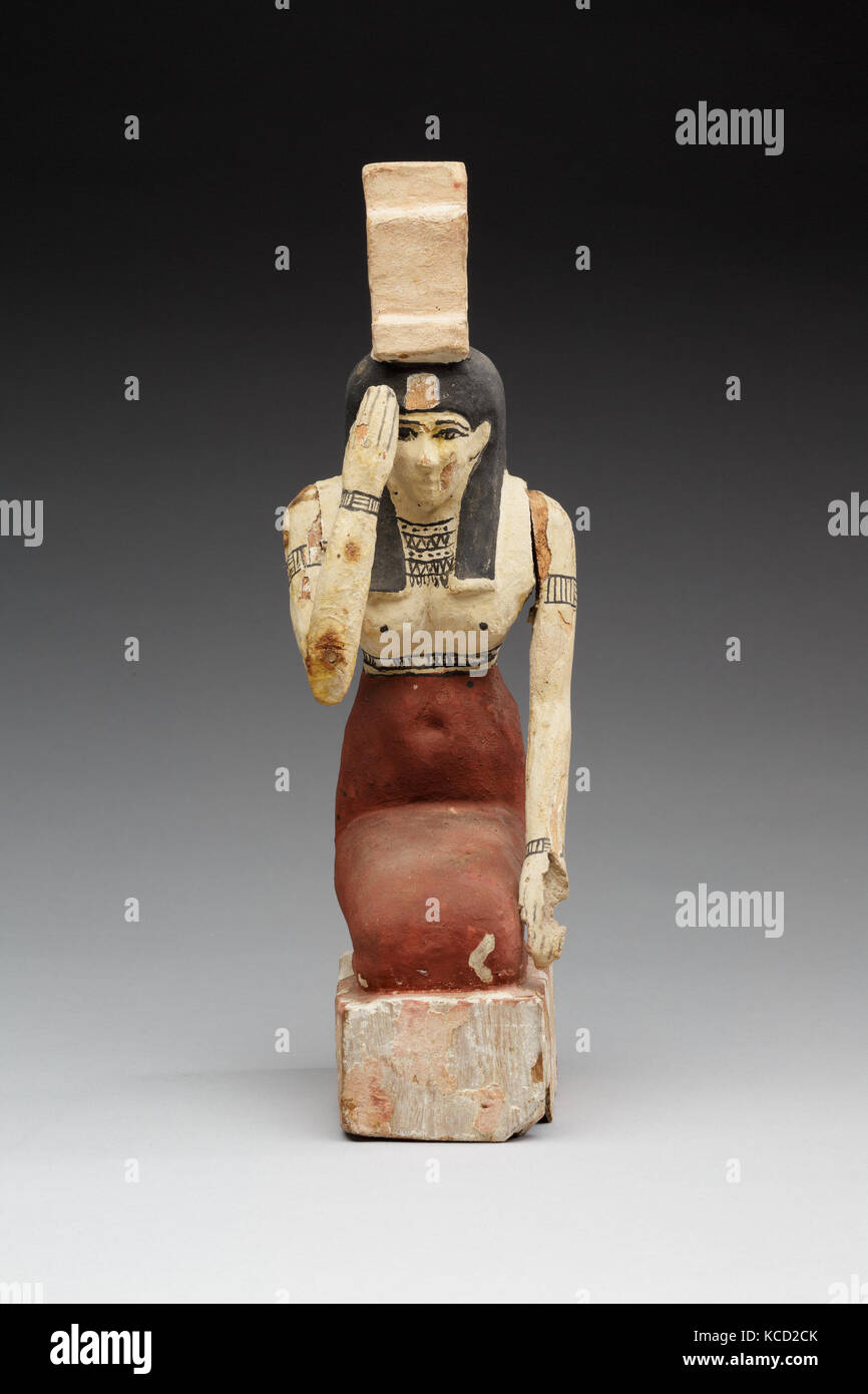 Il lutto di Isis, periodo tolemaico, 332-30 BC, dall'Egitto, Legno, gesso, vernice, H. 24,6 cm (9 11/16 in.); W. 8 cm (3 1/8 in.); D. 10 Foto Stock