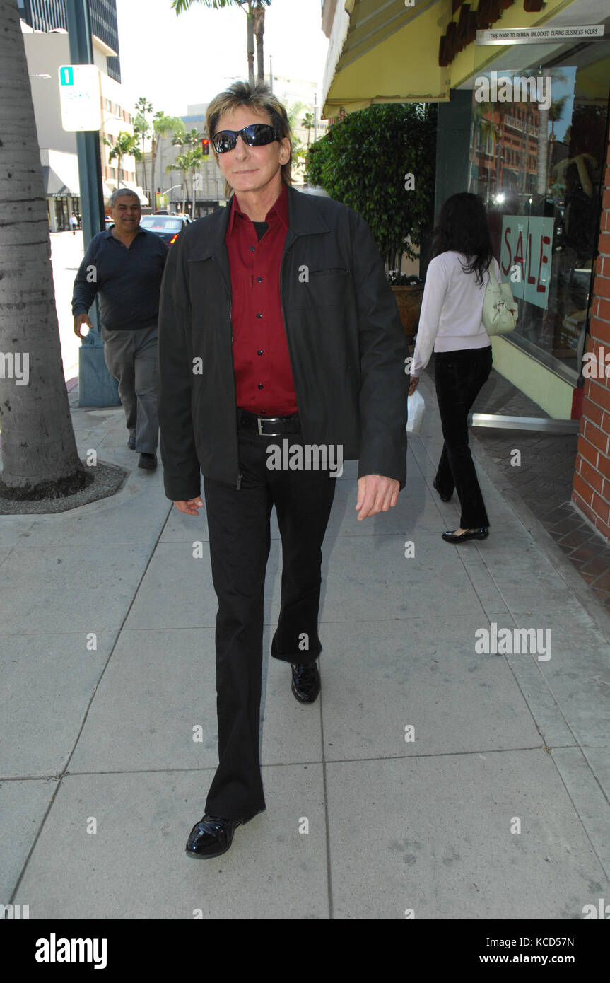 Beverly HILLS - CA - 22 MARZO: Cantante Barry Manilow & Gary Kief fuori e circa a Beverly Hills. Il 22 marzo 2009 a Beverly Hills, California Persone: Gary Kief, Barry Manilow trasmissione Ref: MNC Credit: Hoo-Me.com/MediaPunch Foto Stock